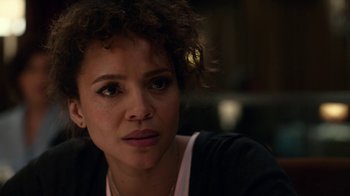 Movie still from “Roman J. Israel, Esq.” (2017), directed by Dan Gilroy – A person sitting down looking at the camera; Close Up shot, Over the shoulder angle