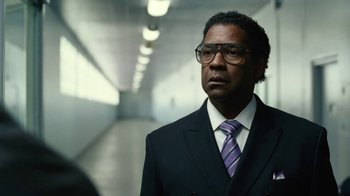 Movie still from “Roman J. Israel, Esq.” (2017), directed by Dan Gilroy – A man in a suit and tie standing in a hallway; Close Up shot, Low angle