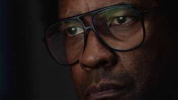 Movie still from “Roman J. Israel, Esq.” (2017), directed by Dan Gilroy – A person wearing glasses; Extreme Close Up shot, Low angle