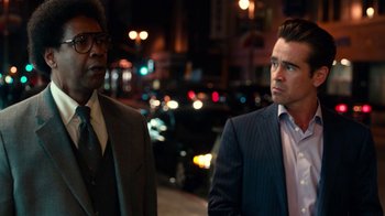 Movie still from “Roman J. Israel, Esq.” (2017), directed by Dan Gilroy – Two men standing next to each other on the sidewalk; Medium shot, Over the shoulder angle