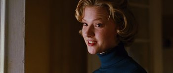 Movie still from “Rounders” (1998), directed by John Dahl – A person with blonde hair; Close Up shot, Low angle