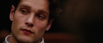 Movie still from “Rounders” (1998), directed by John Dahl – A man's eyes and face; Close Up shot, Low angle