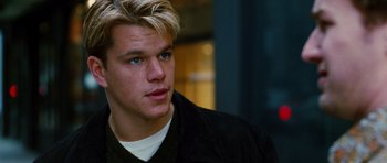 Movie still from “Rounders” (1998), directed by John Dahl – A person wearing a black jacket; Close Up shot, Low angle