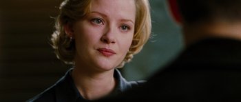 Movie still from “Rounders” (1998), directed by John Dahl – A person with blonde hair; Close Up shot, Over the shoulder angle