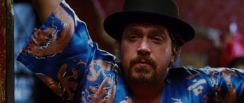 Movie still from “Rounders” (1998), directed by John Dahl – A person wearing a hat; Close Up shot, Low angle