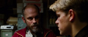 Movie still from “Rounders” (1998), directed by John Dahl – A man and a woman are talking to each other; Close Up shot, Over the shoulder angle