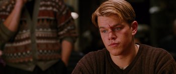 Movie still from “Rounders” (1998), directed by John Dahl – A person wearing a brown shirt; Close Up shot, Over the shoulder angle