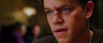 Movie still from “Rounders” (1998), directed by John Dahl – A young man's face with blood on his face; Close Up shot, Over the shoulder angle