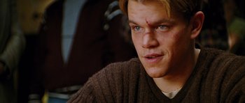 Movie still from “Rounders” (1998), directed by John Dahl – A person wearing a sweater; Close Up shot, Low angle