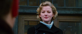 Movie still from “Rounders” (1998), directed by John Dahl – A person wearing a coat; Close Up shot, Low angle