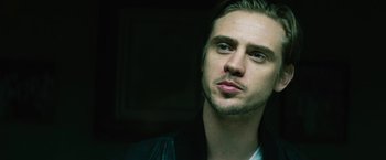 Movie still from “Run All Night” (2015), directed by Jaume Collet-Serra – A person wearing a leather jacket; Close Up shot, Low angle