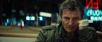 Movie still from “Run All Night” (2015), directed by Jaume Collet-Serra – A person wearing a jacket; Close Up shot, Low angle