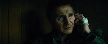 Movie still from “Run All Night” (2015), directed by Jaume Collet-Serra – Liam neeson looking at the camera; Close Up shot, High angle