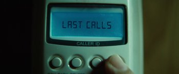 Movie still from “Run All Night” (2015), directed by Jaume Collet-Serra – The last call screen on a phone; Extreme Close Up shot, High angle