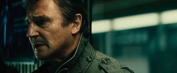 Movie still from “Run All Night” (2015), directed by Jaume Collet-Serra – A man's face with his eyes closed; Close Up shot, Low angle