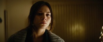 Movie still from “Run All Night” (2015), directed by Jaume Collet-Serra – A person looking at the camera; Close Up shot, Over the shoulder angle