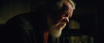 Movie still from “Run All Night” (2015), directed by Jaume Collet-Serra – An old man with a long white beard looking to his left; Close Up shot, Low angle