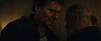 Movie still from “Run All Night” (2015), directed by Jaume Collet-Serra – A person looking at the camera; Close Up shot, Over the shoulder angle