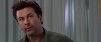 Movie still from “Notting Hill” (1999), directed by Roger Michell – A person wearing a green shirt; Close Up shot, Low angle