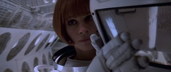 Movie still from “Notting Hill” (1999), directed by Roger Michell – A person wearing a helmet; Close Up shot, Low angle