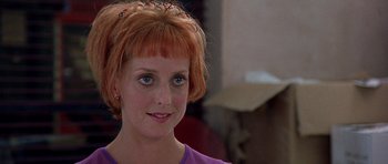 Movie still from “Notting Hill” (1999), directed by Roger Michell – A person with red hair; Close Up shot, Over the shoulder angle