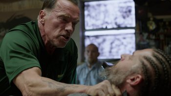 Movie still from “Sabotage” (2014), directed by David Ayer – A man is shaving another man's beard; Close Up shot, Over the shoulder angle