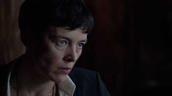 Movie still from “Sabotage” (2014), directed by David Ayer – A person with short hair; Close Up shot, Over the shoulder angle