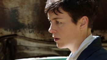 A person with short brown hair