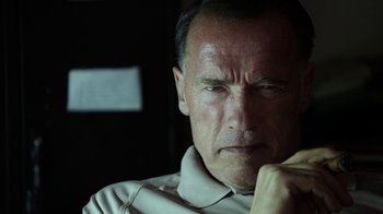 Movie still from “Sabotage” (2014), directed by David Ayer – An older man is looking into the distance; Close Up shot, Low angle