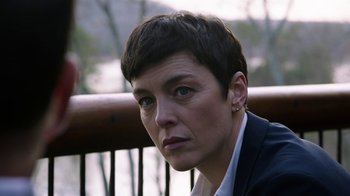 Movie still from “Sabotage” (2014), directed by David Ayer – A person with short hair; Close Up shot, Over the shoulder angle