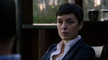 Movie still from “Sabotage” (2014), directed by David Ayer – A person with short hair; Close Up shot, Over the shoulder angle