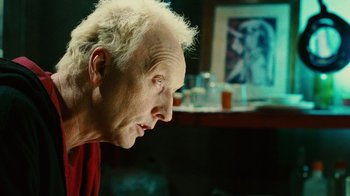 Movie still from “Saw II” (2005), directed by Darren Lynn Bousman – An older man with white hair looking into the distance; Close Up shot, Low angle