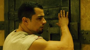 Movie still from “Saw II” (2005), directed by Darren Lynn Bousman – A person with blood on his arm; Close Up shot, Low angle