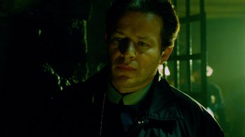 Movie still from “Saw IV” (2007), directed by Darren Lynn Bousman – A person wearing a jacket; Close Up shot, Low angle