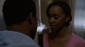 Movie still from “Saw IV” (2007), directed by Darren Lynn Bousman – A man and a woman talking to each other; Close Up shot, Over the shoulder angle