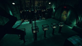 Movie still from “Saw V” (2008), directed by David Hackl – A group of people standing in a dark room; Wide shot, High angle