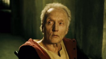 Movie still from “Saw VI” (2009), directed by Kevin Greutert – An old man with a white beard and a red jacket; Close Up shot, Low angle