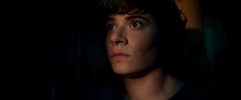 Movie still from “Scary Stories to Tell in the Dark” (2019), directed by André Øvredal – A person looking up at the sky; Close Up shot, High angle