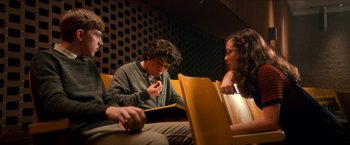 Movie still from “Scary Stories to Tell in the Dark” (2019), directed by André Øvredal – A group of people sitting in a room together; Medium shot, High angle