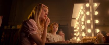 Movie still from “Scary Stories to Tell in the Dark” (2019), directed by André Øvredal – A woman sitting at a table in front of a mirror; Medium shot, Over the shoulder angle