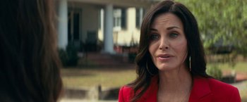 Movie still from “Scream” (2022), directed by Matt Bettinelli-Olpin – A person wearing a red jacket; Close Up shot, Over the shoulder angle