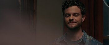 Movie still from “Scream” (2022), directed by Matt Bettinelli-Olpin – A person with his eyes closed; Close Up shot, Over the shoulder angle