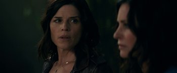 Movie still from “Scream” (2022), directed by Matt Bettinelli-Olpin – A woman in a leather jacket looking at another woman in a leather jacket; Close Up shot, Over the shoulder angle