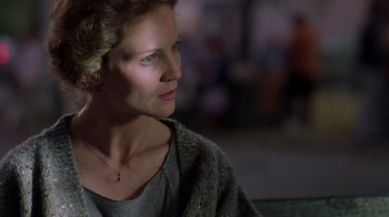 Movie still from “Searching for Bobby Fischer” (1993), directed by Steven Zaillian – A person sitting on a couch; Close Up shot, High angle