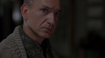 Movie still from “Searching for Bobby Fischer” (1993), directed by Steven Zaillian – A person wearing a shirt; Close Up shot, Low angle