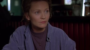 Movie still from “Searching for Bobby Fischer” (1993), directed by Steven Zaillian – A person wearing a purple shirt; Close Up shot, High angle