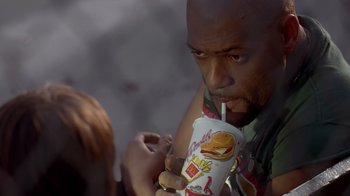 Movie still from “Searching for Bobby Fischer” (1993), directed by Steven Zaillian – A person holding a cup of food; Close Up shot, High angle
