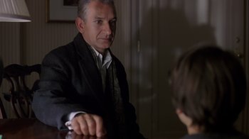 Movie still from “Searching for Bobby Fischer” (1993), directed by Steven Zaillian – An older man is talking to a young boy; Close Up shot, Over the shoulder angle