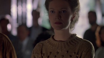 Movie still from “Searching for Bobby Fischer” (1993), directed by Steven Zaillian – A woman in a sweater is looking at the camera; Close Up shot, Over the shoulder angle
