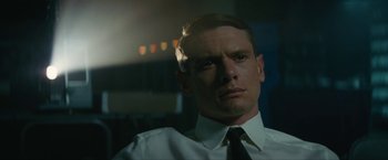 Movie still from “Seberg” (2019), directed by Benedict Andrews – A person wearing a shirt and a tie; Close Up shot, Low angle